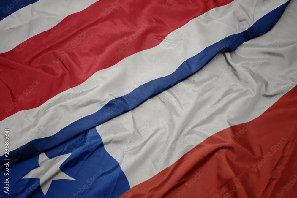waving colorful flag of chile and national flag of costa rica.