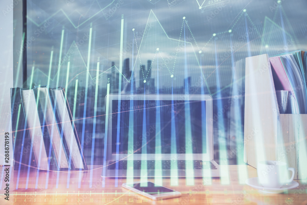Forex market chart hologram and personal computer background. Double exposure. Concept of investment. Forex market chart hologram and personal computer background. Double exposure. Concept of investment.