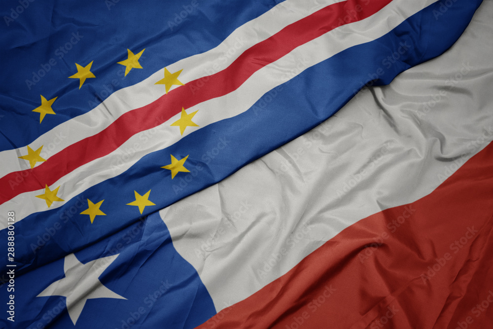 waving colorful flag of chile and national flag of cape verde.