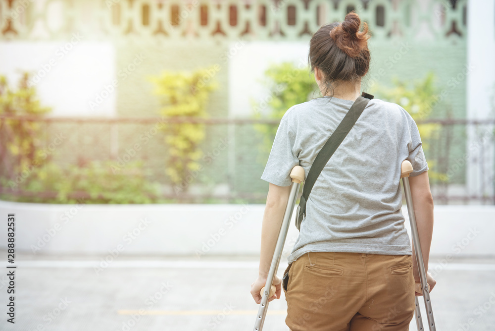 Φωτογραφία Backside of asian woman with walking stick,healthcare and medical concept