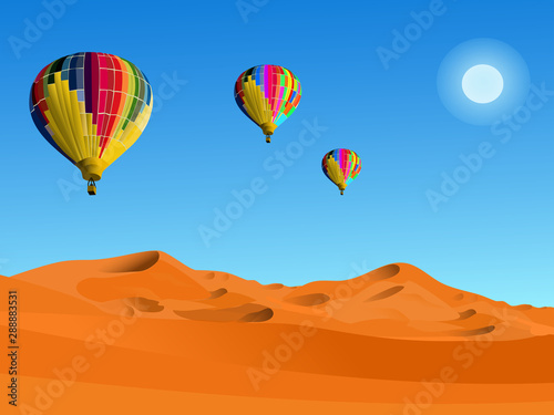Colorful balloons floating in the sky Above the desert With a blue sky in the background
