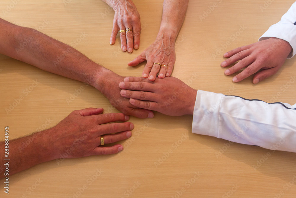 overlapping hands as a symbol of friendship and excellent teamwork overlapping hands as a symbol of friendship and excellent teamwork