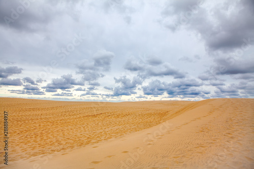 low clouds over the sandy beach