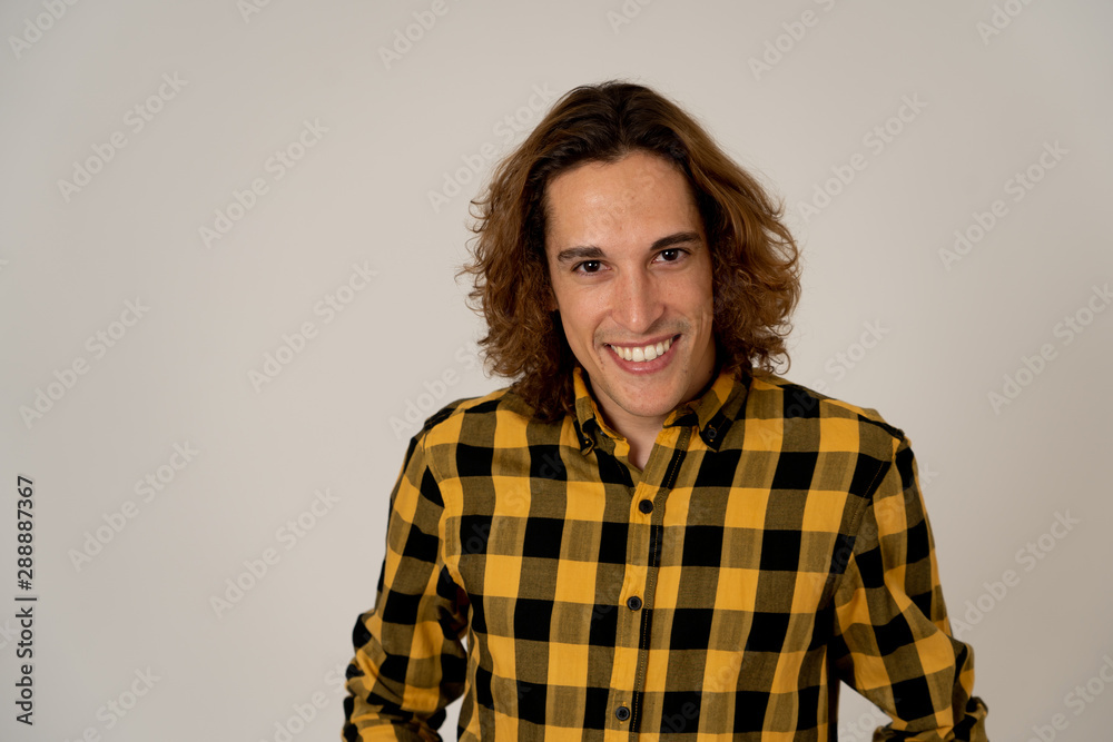 Portrait of young teenager with long hair posing happy for the camera. Beauty concept and lifestyle Portrait of young teenager with long hair posing happy for the camera. Beauty concept and lifestyle