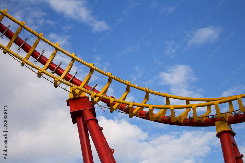 Roller Coaster Ride in Amusement Park. Entertainment and Adventure Roller Coaster Ride in Amusement Park. Entertainment and Adventure
