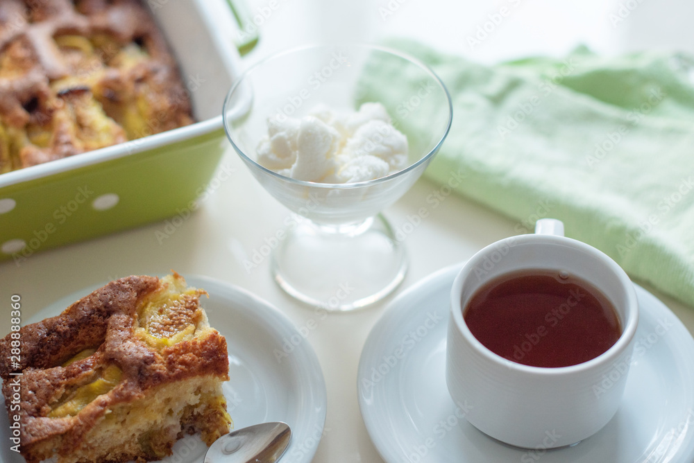 Fig cake, ice cream and a cup of tea