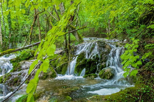Fototapeta Naklejka Na Ścianę i Meble -  great fluidity of water in the Tobera waterfalls, in the Basque country