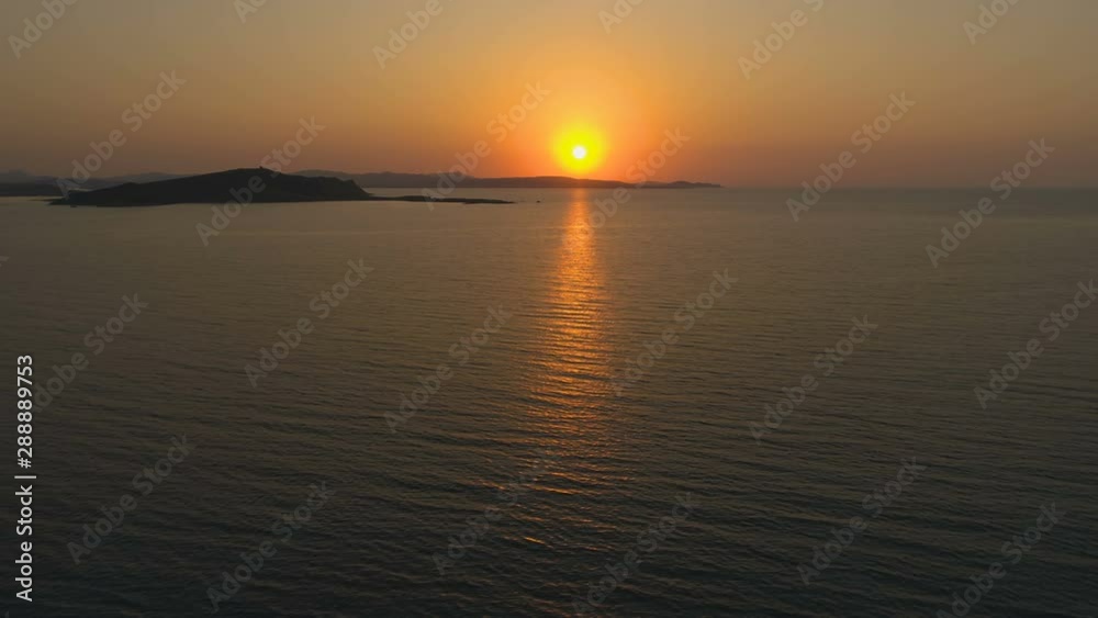 Beautiful orange sunset over sea in Greece Beautiful orange sunset over sea in Greece
