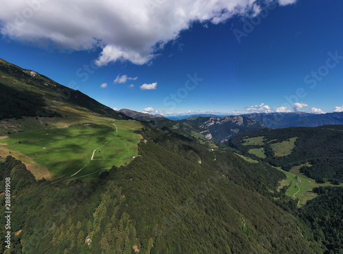Aerial photography. Panoramic view of the Alps north of Italy. Trento Region. Great trip to the Alps.