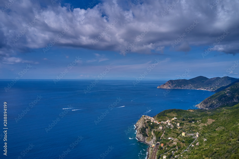 Panorama view of Corniglia village one of Cinque Terre in La Spezia, Italy. Flight by a drone.