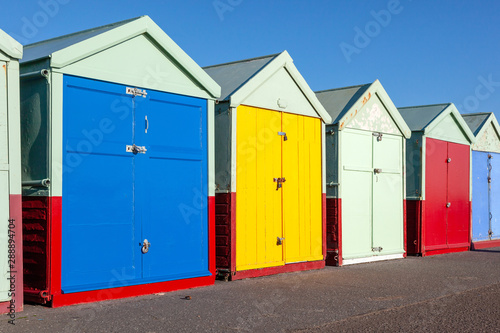 Colorful Brighton beach huts © magann