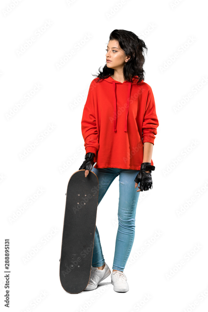 Young skater woman with red sweatshirt Young skater woman with red sweatshirt