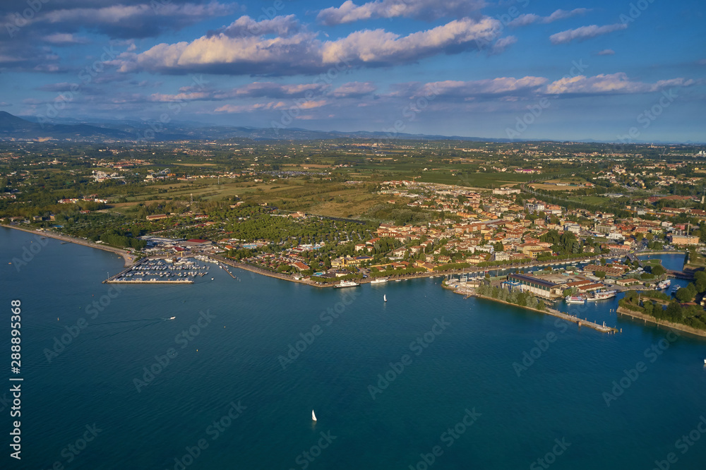 Fototapeta premium Beautiful view of the city of Peschiera del Garda, Italy. Aerial photography with drone.