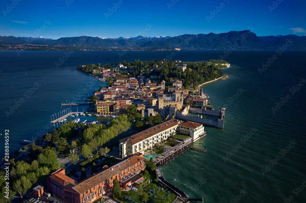 Rocca Scaligera Castle in Sirmione Lake Garda Italy. Aerial view.