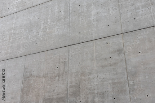 Wall of dark gray concrete blocks