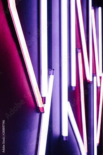 Neon lights. Light colorful blue and red neon lights over dark background