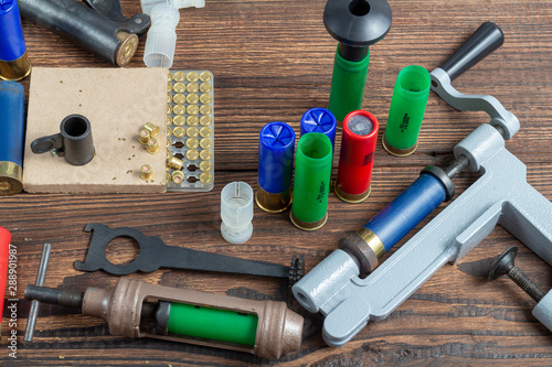 Canvas Print reloading process shotgun shells with special reload equipment