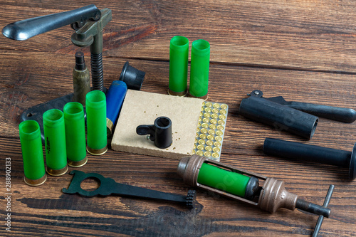 Canvas Print reloading process shotgun shells with special reload equipment