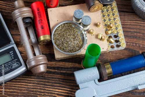 Canvas Print reloading process shotgun shells with special reload equipment