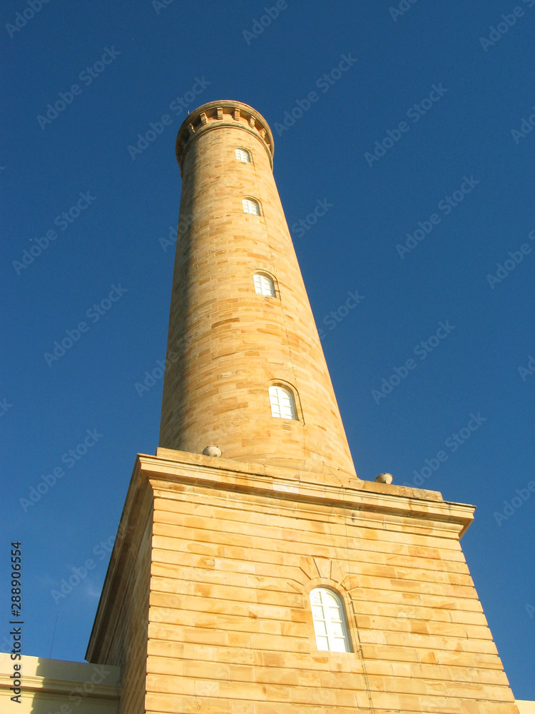 A lighthouse, Chipiona, Spain, the highest lighthouse in Spain, low angle view.