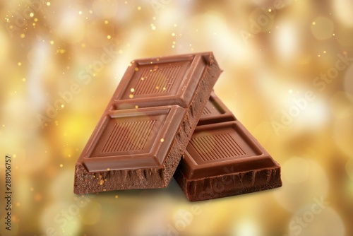 Delicious chocolates isolated on background photo