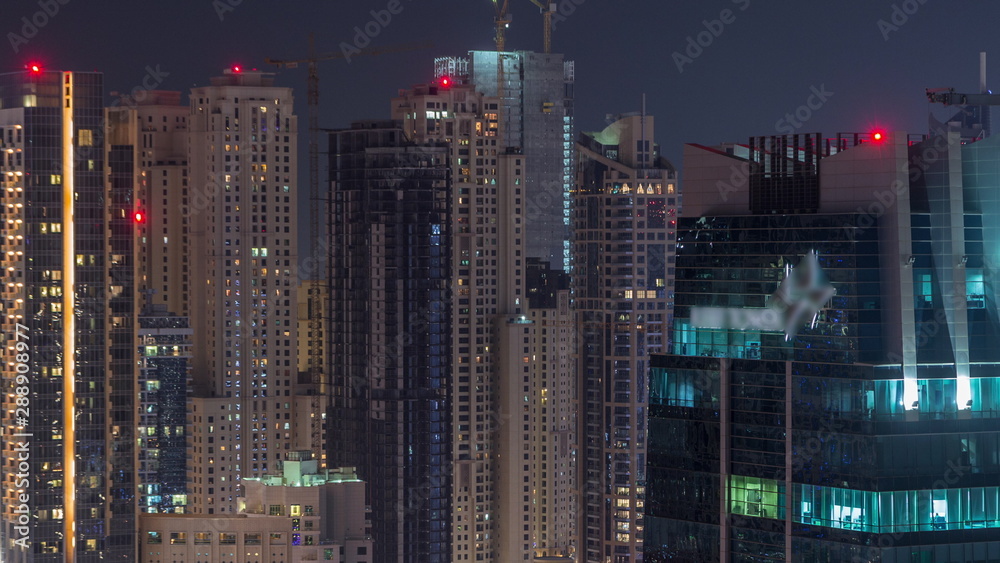 Rooftop view on amazing Dubai marina and JLT skyscrapers aerial timelapse, Dubai, United Arab Emirates