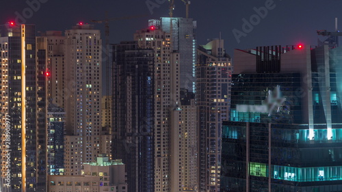 Rooftop view on amazing Dubai marina and JLT skyscrapers aerial timelapse  Dubai  United Arab Emirates