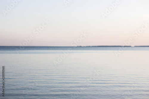 The sea at sunset. Amazing sea sunset. Sunset sea waves. Summer sunset. Beautiful sea landscape evening sunset sea and sky horizon.