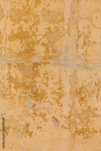 old ocre painted wall