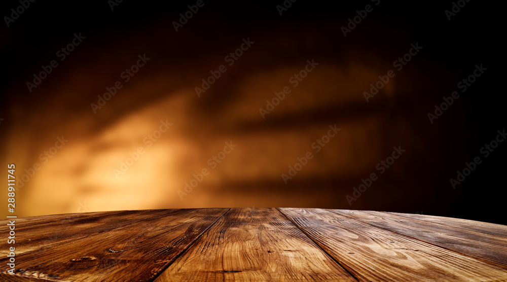 Desk of free space and wall background with shadow  - obrazy, fototapety, plakaty 