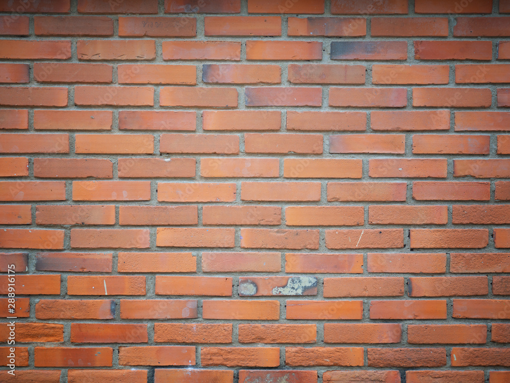 Fototapeta premium Red brick wall background.