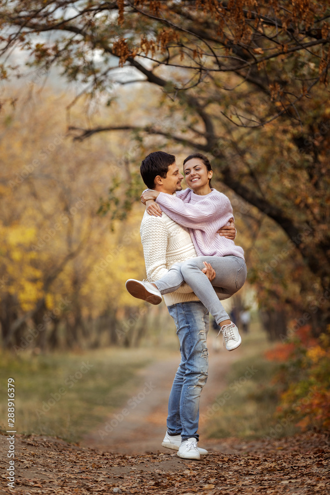 Couple in love having fun in beautiful autumn park. happy moments