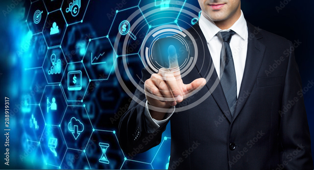 Young executive man touching an imaginary screen Young executive man touching an imaginary screen