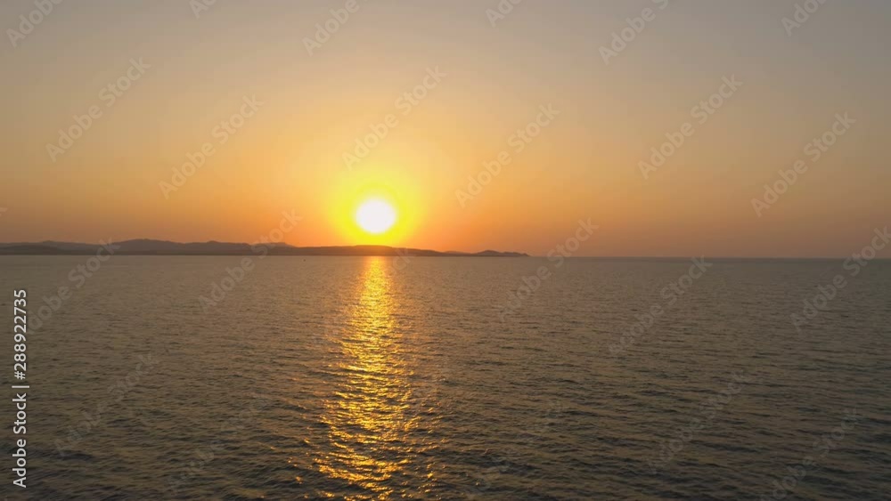Beautiful orange sunset over sea in Greece Beautiful orange sunset over sea in Greece