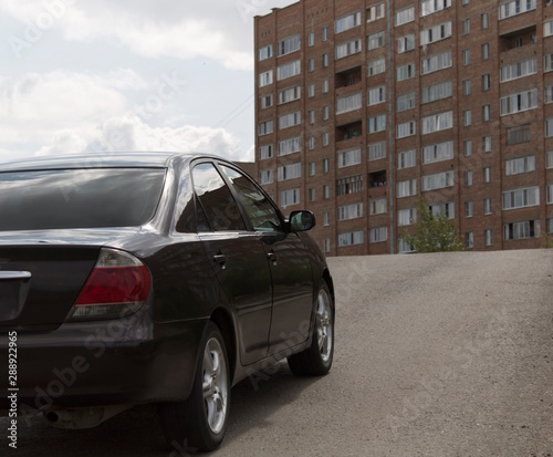 Black car on the road.