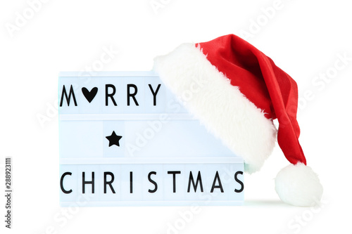 Lightbox with words Merry Christmas and red santa hat on white background