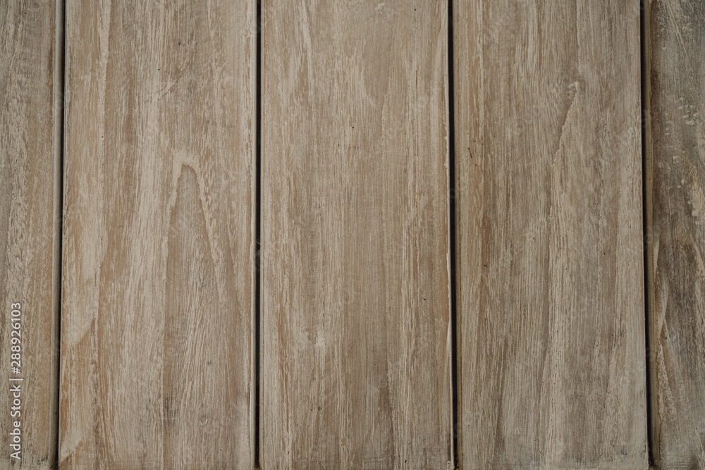 Naklejka premium Brown wood vertical texture natural tree background