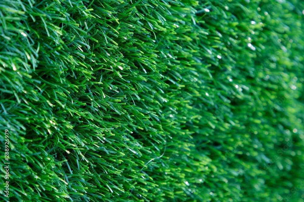 Side view of artificial grass wall, Green texture background. Side view of artificial grass wall, Green texture background.