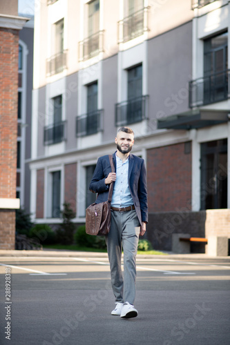 Wallpaper Mural Bearded man leaving house and walking to office Torontodigital.ca