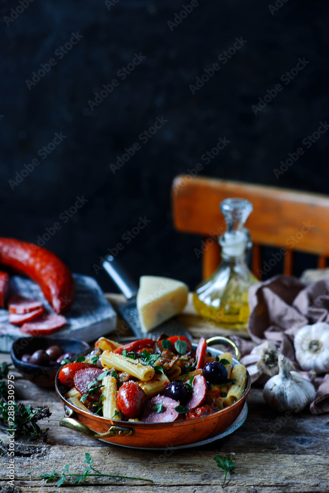 Pasta with sausage and vegetables.. .style rustic