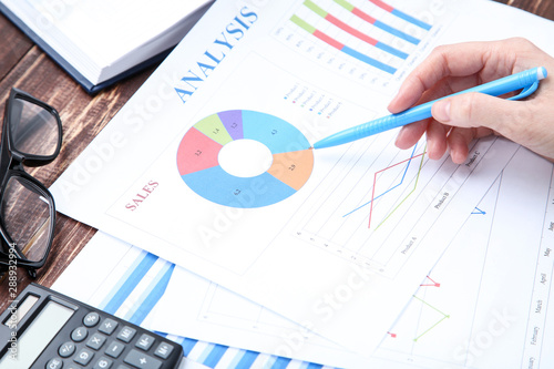 Woman working with financial papers