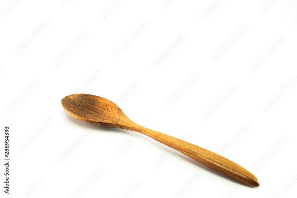 spoon and fork wooden isolated on white background with selective focus. spoon and fork wooden isolated on white background with selective focus.