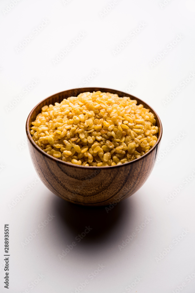 Salty and Fried Moong Dal Namkeen served in a bowl, selective focus Salty and Fried Moong Dal Namkeen served in a bowl, selective focus