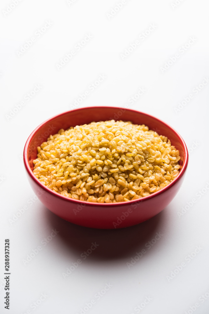 Salty and Fried Moong Dal Namkeen served in a bowl, selective focus Salty and Fried Moong Dal Namkeen served in a bowl, selective focus