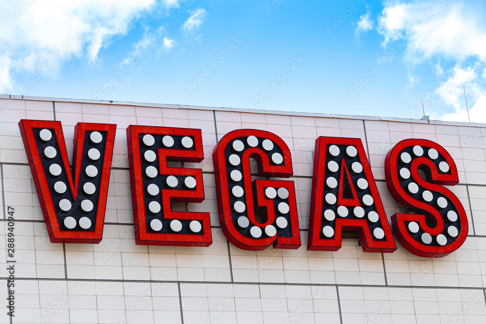 Vegas letters on the building. Blue sky. Vegas signboard. Vegas letters on the building. Blue sky. Vegas signboard.