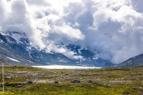 storm clouds over mountain road in Norway