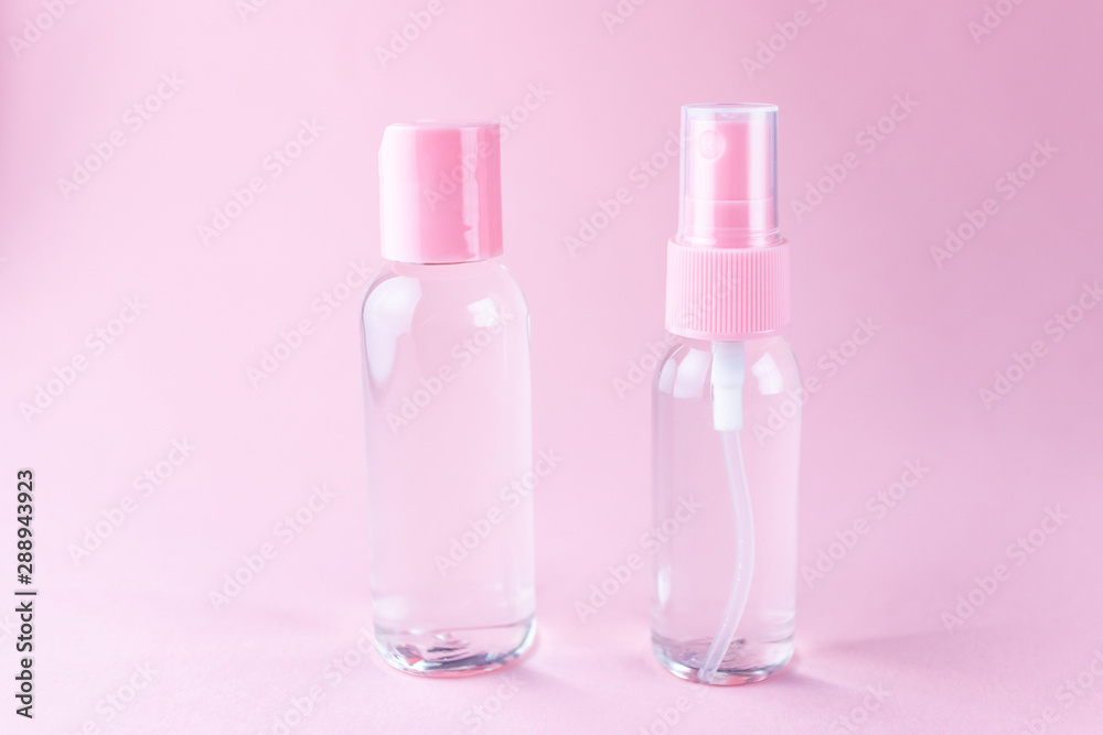 Cosmetic bottles with transparent lotion on a pastel pink background. The concept of cosmetics, skin care, beauty and health. Minimalism, place for text. Cosmetic bottles with transparent lotion on a pastel pink background. The concept of cosmetics, skin care, beauty and health. Minimalism, place for text.
