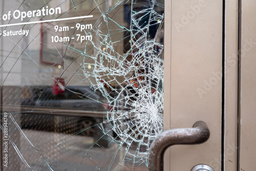 Картината върху платно Broken glass door window