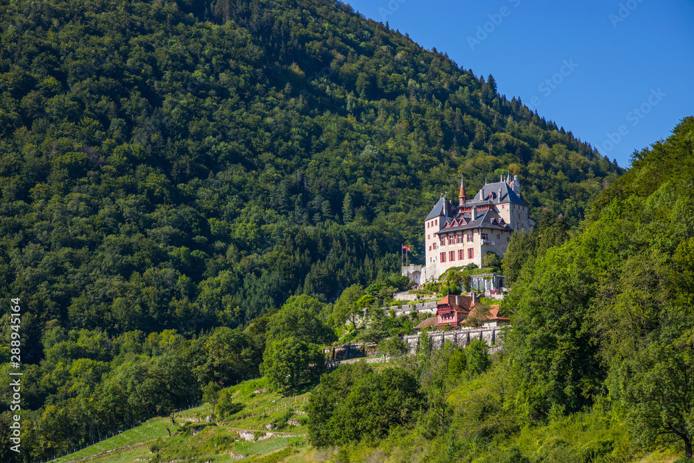 The Chateau de Menthon, a medieval castle located in the commune of Menthon Saint-Bernard south of Annecy in the Haute-Savoie departement of France
