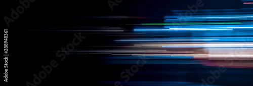 Abstract motion light trails on the dark background